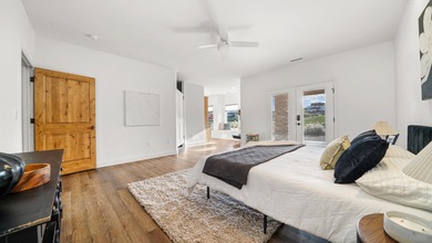 Introducing this beautifully updated ranch style home adjacent on The Golf Club At Redlands Mesa in Colorado - for sale on GolfHomes.com, golf home, golf lot