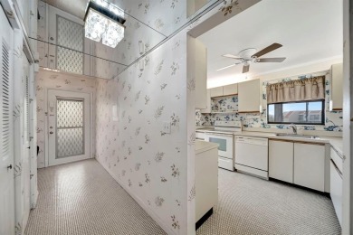SPACIOUS 2/2 PENTHOUSE CORNER UNIT IN MANICURED 55+ LAKES OF on Inverrary Country Club in Florida - for sale on GolfHomes.com, golf home, golf lot