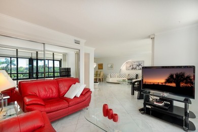 Beautifully renovated corner residence combining the comfort of on The Country Club At Boca Raton in Florida - for sale on GolfHomes.com, golf home, golf lot