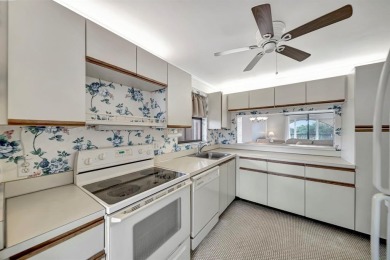 SPACIOUS 2/2 PENTHOUSE CORNER UNIT IN MANICURED 55+ LAKES OF on Inverrary Country Club in Florida - for sale on GolfHomes.com, golf home, golf lot