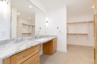 Introducing this beautifully updated ranch style home adjacent on The Golf Club At Redlands Mesa in Colorado - for sale on GolfHomes.com, golf home, golf lot