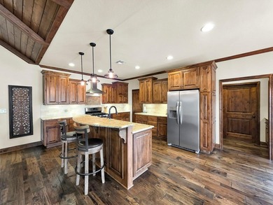 Custom-built and perfectly positioned on Hole #6 of the renowned on Rayburn Country Club in Texas - for sale on GolfHomes.com, golf home, golf lot