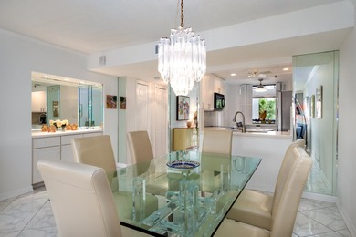 Beautifully renovated corner residence combining the comfort of on The Country Club At Boca Raton in Florida - for sale on GolfHomes.com, golf home, golf lot