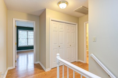 Brick-front home overlooking the 18th tee at Hedingham Golf Club on Hedingham Golf and Athletic Club in North Carolina - for sale on GolfHomes.com, golf home, golf lot