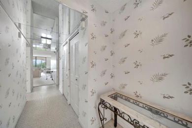SPACIOUS 2/2 PENTHOUSE CORNER UNIT IN MANICURED 55+ LAKES OF on Inverrary Country Club in Florida - for sale on GolfHomes.com, golf home, golf lot