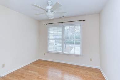 Brick-front home overlooking the 18th tee at Hedingham Golf Club on Hedingham Golf and Athletic Club in North Carolina - for sale on GolfHomes.com, golf home, golf lot