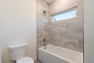 Introducing this beautifully updated ranch style home adjacent on The Golf Club At Redlands Mesa in Colorado - for sale on GolfHomes.com, golf home, golf lot