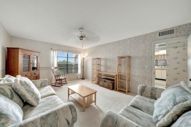 SPACIOUS 2/2 PENTHOUSE CORNER UNIT IN MANICURED 55+ LAKES OF on Inverrary Country Club in Florida - for sale on GolfHomes.com, golf home, golf lot