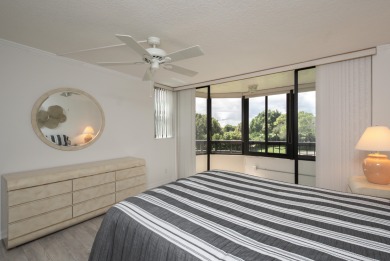 Beautifully renovated corner residence combining the comfort of on The Country Club At Boca Raton in Florida - for sale on GolfHomes.com, golf home, golf lot
