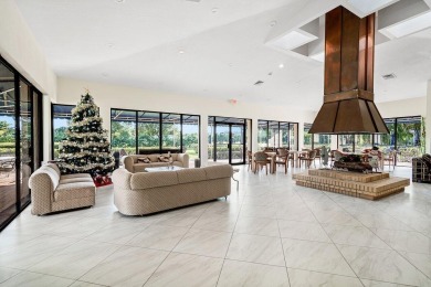 Beautifully renovated corner residence combining the comfort of on The Country Club At Boca Raton in Florida - for sale on GolfHomes.com, golf home, golf lot