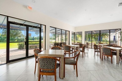 Beautifully renovated corner residence combining the comfort of on The Country Club At Boca Raton in Florida - for sale on GolfHomes.com, golf home, golf lot