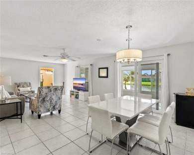 This charming 2 bedroom, 2 bath waterfront residence offers on The Glades Golf and Country Club in Florida - for sale on GolfHomes.com, golf home, golf lot