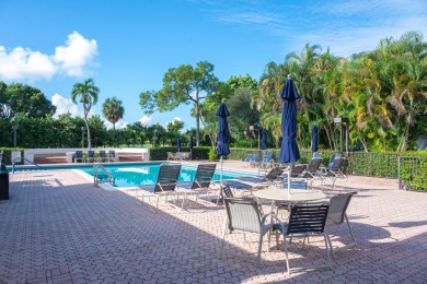 Beautifully renovated corner residence combining the comfort of on The Country Club At Boca Raton in Florida - for sale on GolfHomes.com, golf home, golf lot