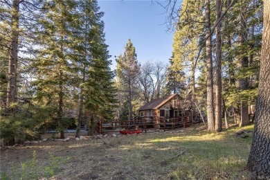 Embrace nature's beauty in this authentic log cabin, boasting on Big Bear Mountain Ski and Golf Resort in California - for sale on GolfHomes.com, golf home, golf lot
