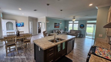 Welcome to 3915 Scramble Drive, a stunning 2018 Palm Harbor home on The Riverside Golf Club in Florida - for sale on GolfHomes.com, golf home, golf lot