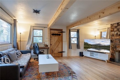 Embrace nature's beauty in this authentic log cabin, boasting on Big Bear Mountain Ski and Golf Resort in California - for sale on GolfHomes.com, golf home, golf lot