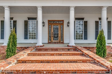 Welcome to this elegant 6-bedroom, 4.5-bathroom home with a on Colonial Country Club Deerfield in Mississippi - for sale on GolfHomes.com, golf home, golf lot