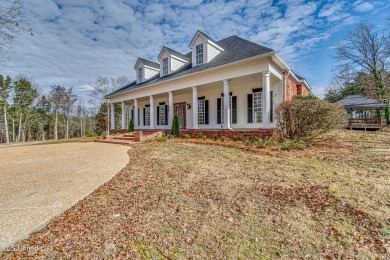 Welcome to this elegant 6-bedroom, 4.5-bathroom home with a on Colonial Country Club Deerfield in Mississippi - for sale on GolfHomes.com, golf home, golf lot