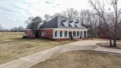 Welcome to this elegant 6-bedroom, 4.5-bathroom home with a on Colonial Country Club Deerfield in Mississippi - for sale on GolfHomes.com, golf home, golf lot