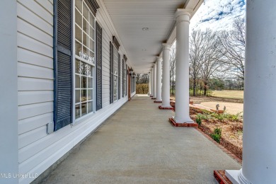 Welcome to this elegant 6-bedroom, 4.5-bathroom home with a on Colonial Country Club Deerfield in Mississippi - for sale on GolfHomes.com, golf home, golf lot