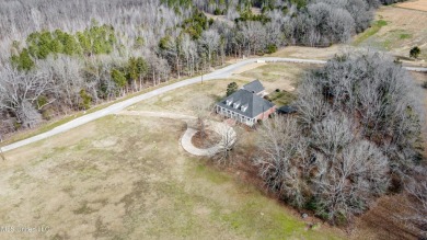 Welcome to this elegant 6-bedroom, 4.5-bathroom home with a on Colonial Country Club Deerfield in Mississippi - for sale on GolfHomes.com, golf home, golf lot