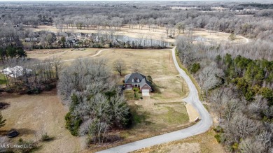 Welcome to this elegant 6-bedroom, 4.5-bathroom home with a on Colonial Country Club Deerfield in Mississippi - for sale on GolfHomes.com, golf home, golf lot