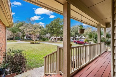 Check out this beautifully landscaped brick and wood exterior on Wedgefield Plantation Golf Club in South Carolina - for sale on GolfHomes.com, golf home, golf lot