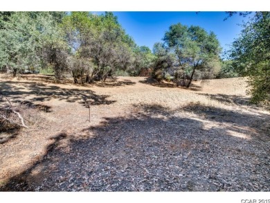 A great over sized corner lot with a gentle down slope. A on Greenhorn Creek Resort in California - for sale on GolfHomes.com, golf home, golf lot
