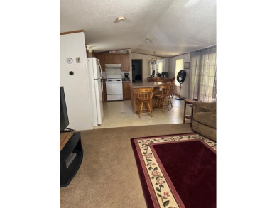 Location! Location! This Waterview 3B/2B MH is walk in ready & on Cypress Bend Golf Course in Texas - for sale on GolfHomes.com, golf home, golf lot