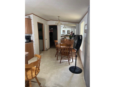 Location! Location! This Waterview 3B/2B MH is walk in ready & on Cypress Bend Golf Course in Texas - for sale on GolfHomes.com, golf home, golf lot