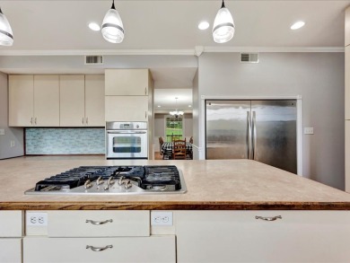This sizable home has 5-bedrooms and 3 updated bathrooms. There on Woodland Hills Golf Club in Texas - for sale on GolfHomes.com, golf home, golf lot
