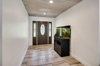 Enjoy peaceful living on 2.5 acres with this 3-bedroom, 3-bath on Somerville Country Club in Tennessee - for sale on GolfHomes.com, golf home, golf lot