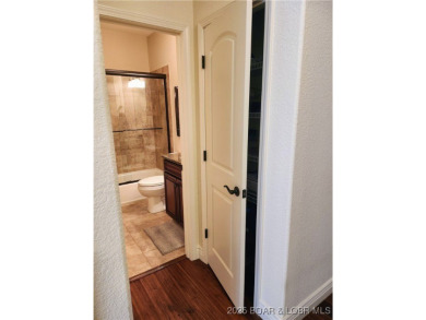 ? A COVETED BELLTOWER VILLA WITH BOAT SLIP! ? Rare opportunity on The Club At Old Kinderhook in Missouri - for sale on GolfHomes.com, golf home, golf lot