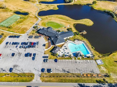 Offered is a flat, well-draining, wooded home site almost half on Olde Point Golf and Country Club in North Carolina - for sale on GolfHomes.com, golf home, golf lot