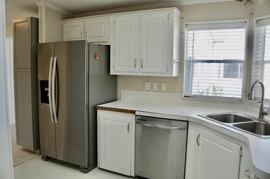 Priced to Sell. New Interior Paint. New Kitchen Tile Flooring on Savanna Golf Club in Florida - for sale on GolfHomes.com, golf home, golf lot