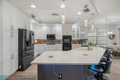 Welcome to your beautifully remodeled, one-level townhome! This on Parkland Golf Club in Florida - for sale on GolfHomes.com, golf home, golf lot
