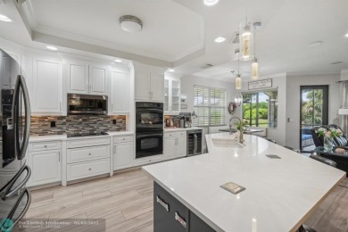 Welcome to your beautifully remodeled, one-level townhome! This on Parkland Golf Club in Florida - for sale on GolfHomes.com, golf home, golf lot