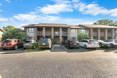 In the heart of Pointe Royale, you'll find this homey condo on Pointe Royale Village Country Club in Missouri - for sale on GolfHomes.com, golf home, golf lot
