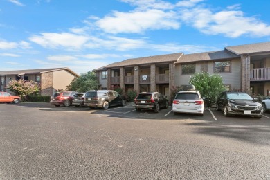 In the heart of Pointe Royale, you'll find this homey condo on Pointe Royale Village Country Club in Missouri - for sale on GolfHomes.com, golf home, golf lot