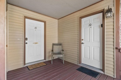 In the heart of Pointe Royale, you'll find this homey condo on Pointe Royale Village Country Club in Missouri - for sale on GolfHomes.com, golf home, golf lot