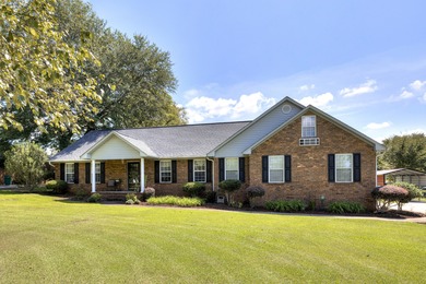 This beautiful home features luxury vinyl plank and ceramic on Beech Creek Golf Club in South Carolina - for sale on GolfHomes.com, golf home, golf lot