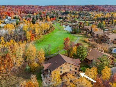 Vista Del Verde #4 is a peaceful corner condo that overlooks the on Schuss Mountain Golf Club in Michigan - for sale on GolfHomes.com, golf home, golf lot