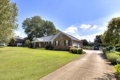 This beautiful home features luxury vinyl plank and ceramic on Beech Creek Golf Club in South Carolina - for sale on GolfHomes.com, golf home, golf lot