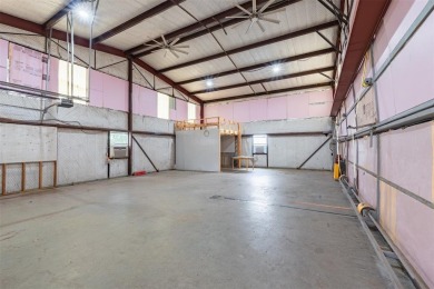 RUNWAY LIVING AT ITS FINEST!  Live where you fly in this on Pecan Plantation Country Club in Texas - for sale on GolfHomes.com, golf home, golf lot