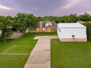 RUNWAY LIVING AT ITS FINEST!  Live where you fly in this on Pecan Plantation Country Club in Texas - for sale on GolfHomes.com, golf home, golf lot