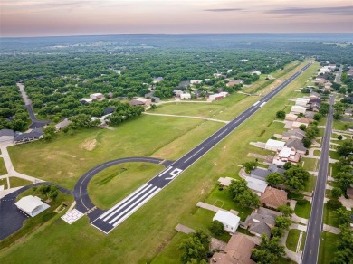 RUNWAY LIVING AT ITS FINEST!  Live where you fly in this on Pecan Plantation Country Club in Texas - for sale on GolfHomes.com, golf home, golf lot