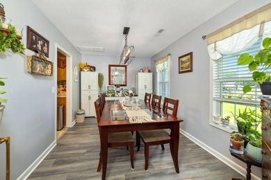 This beautiful home features luxury vinyl plank and ceramic on Beech Creek Golf Club in South Carolina - for sale on GolfHomes.com, golf home, golf lot