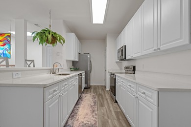 Discover refined coastal living in the prestigious gated on Wachesaw Plantation East Golf Course in South Carolina - for sale on GolfHomes.com, golf home, golf lot