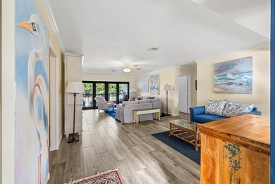 Spacious 3-bedroom, 2-bath condo featuring wood-look tile on Quail Ridge Golf Course and Country Club in Florida - for sale on GolfHomes.com, golf home, golf lot