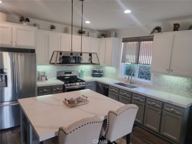This beautiful KHovnanian built home has been recently updated on Hemet Golf Club in California - for sale on GolfHomes.com, golf home, golf lot